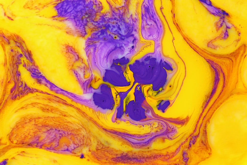 a close up of a yellow and purple substance