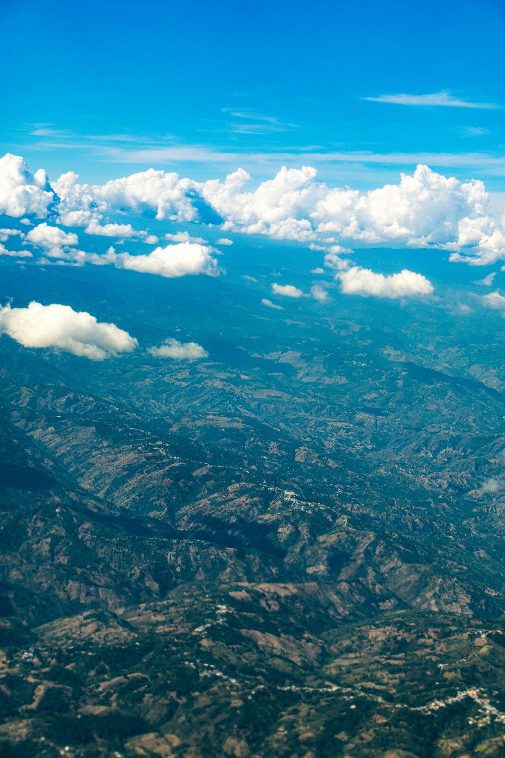 a view of the sky and clouds from an airplane