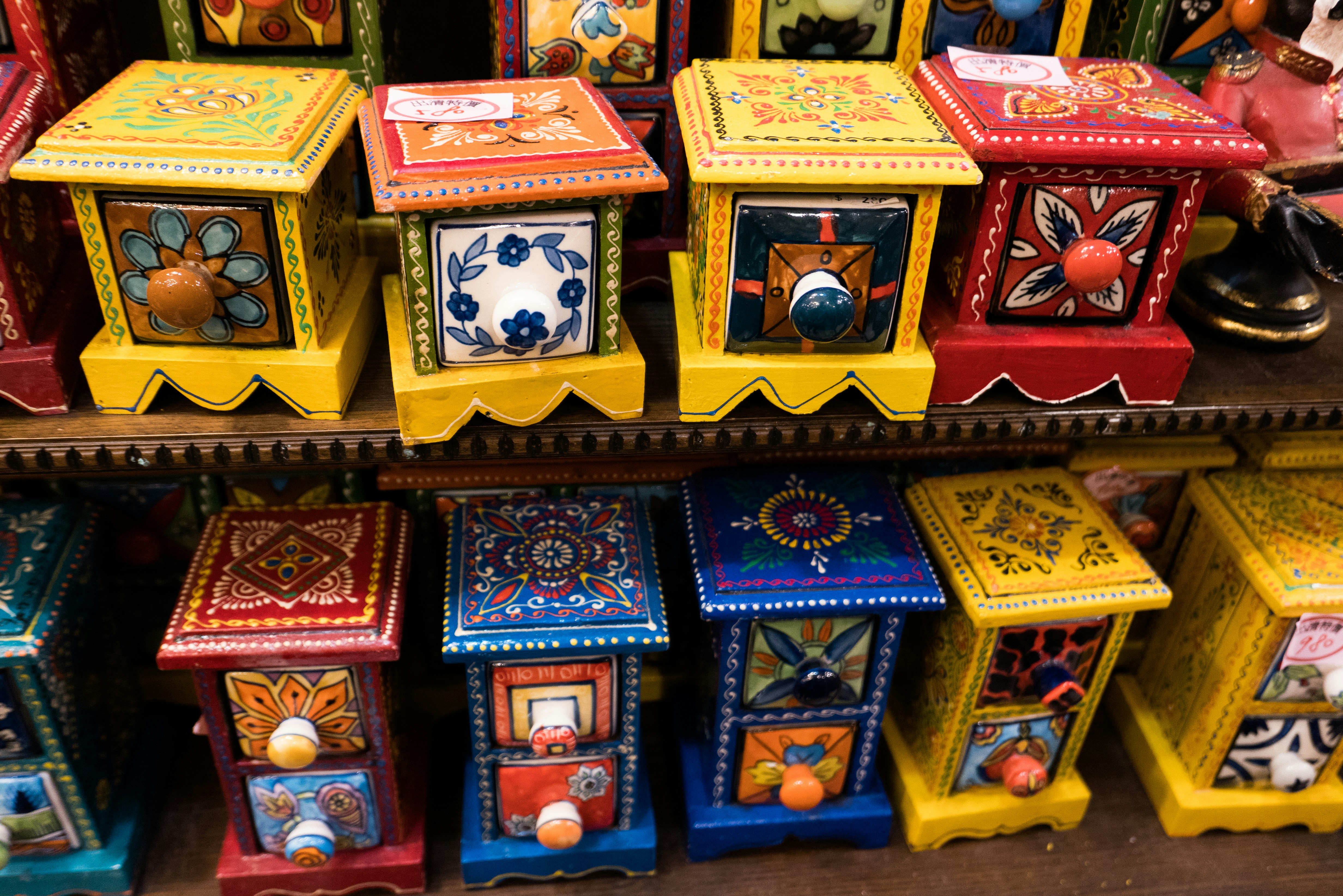 Colorful gift boxes on shelf
