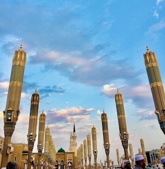 a group of people standing in front of a building