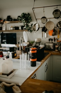 a kitchen filled with lots of pots and pans