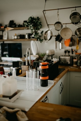 a kitchen filled with lots of pots and pans