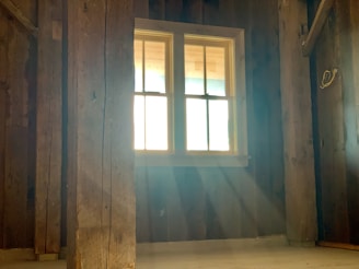 A serene, tidy room with natural light streaming in.