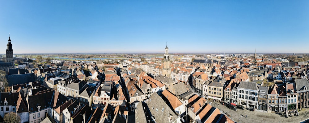 a panoramic view of a city with a river running through it