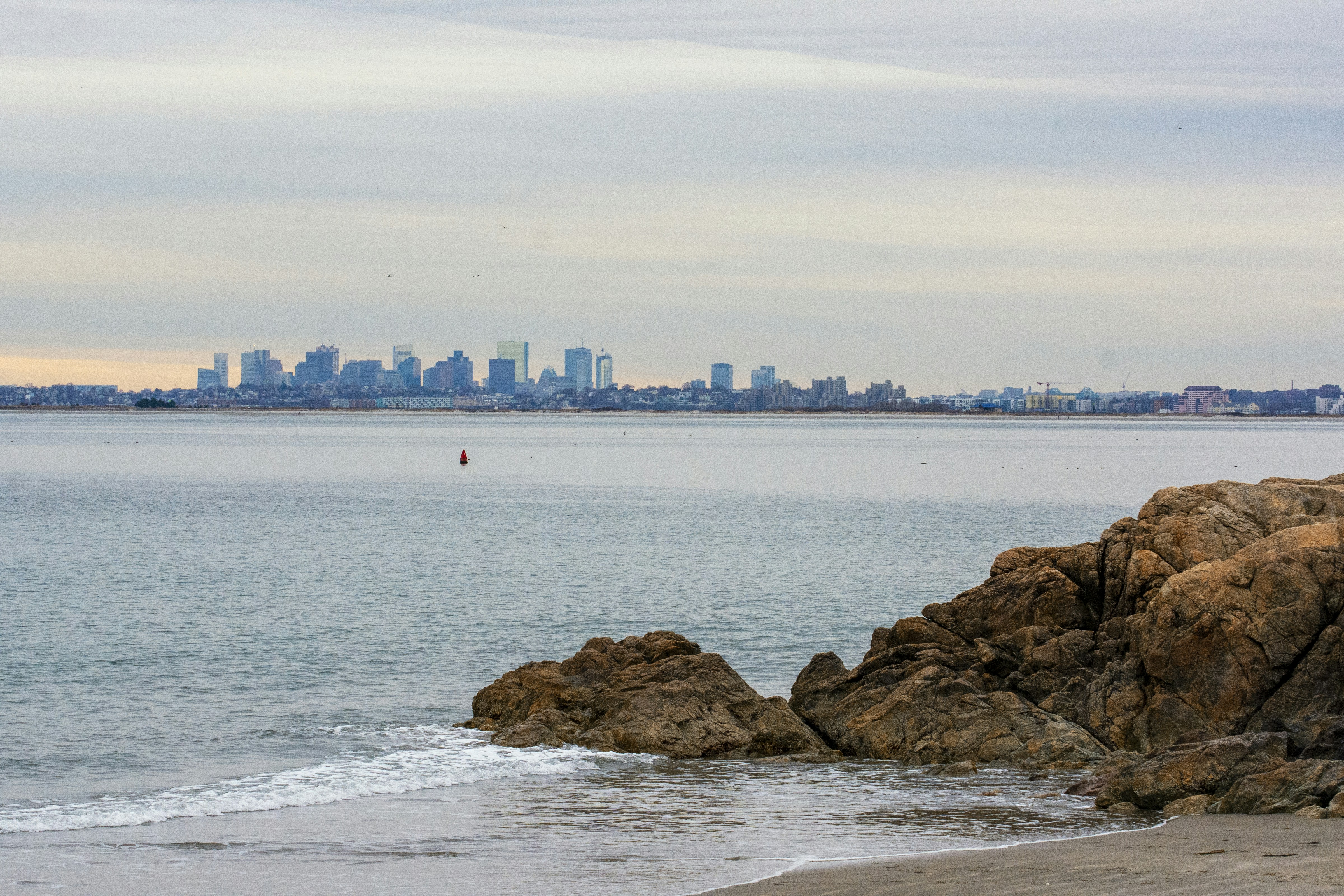 a view of a city from the ocean