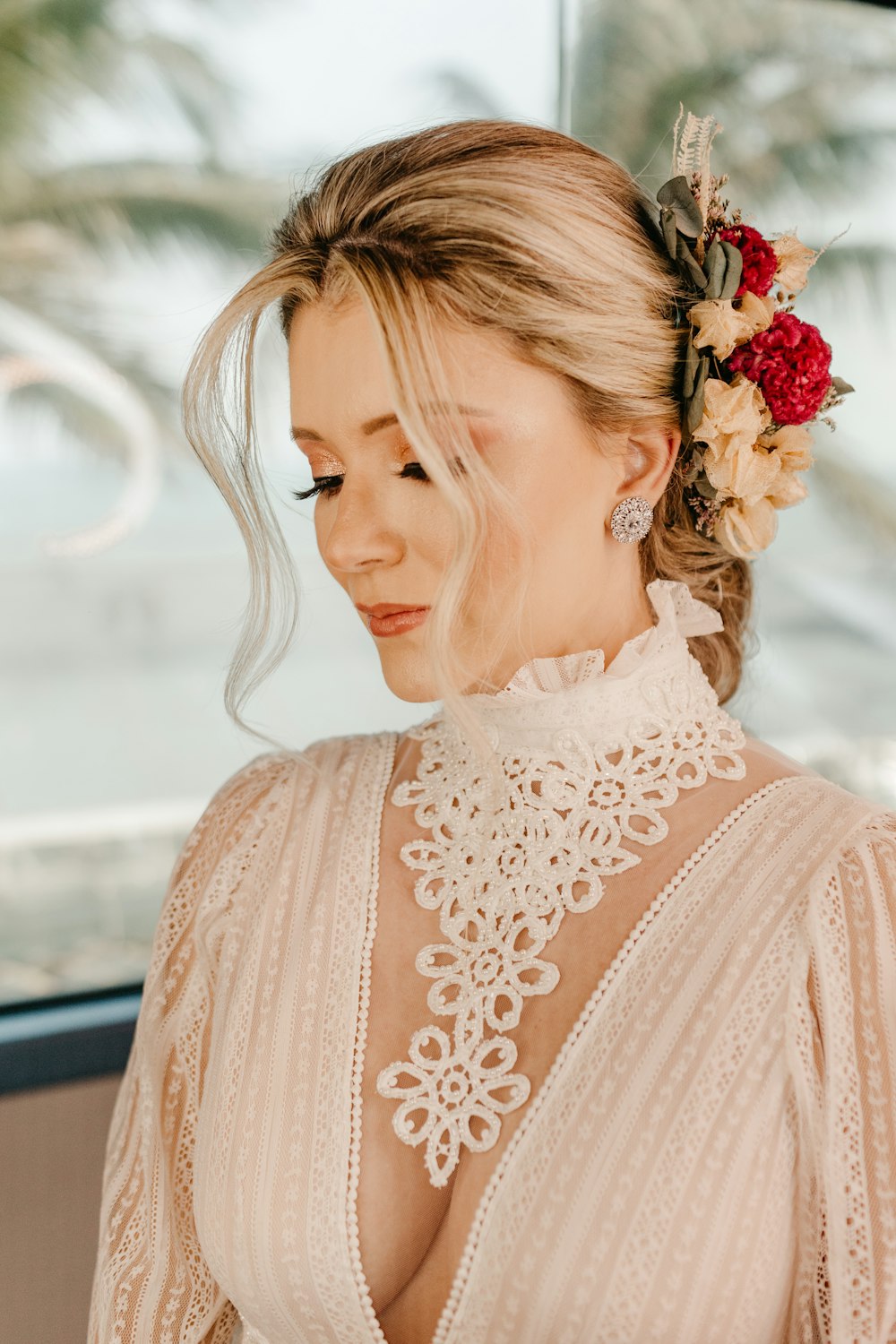 a woman with a flower in her hair