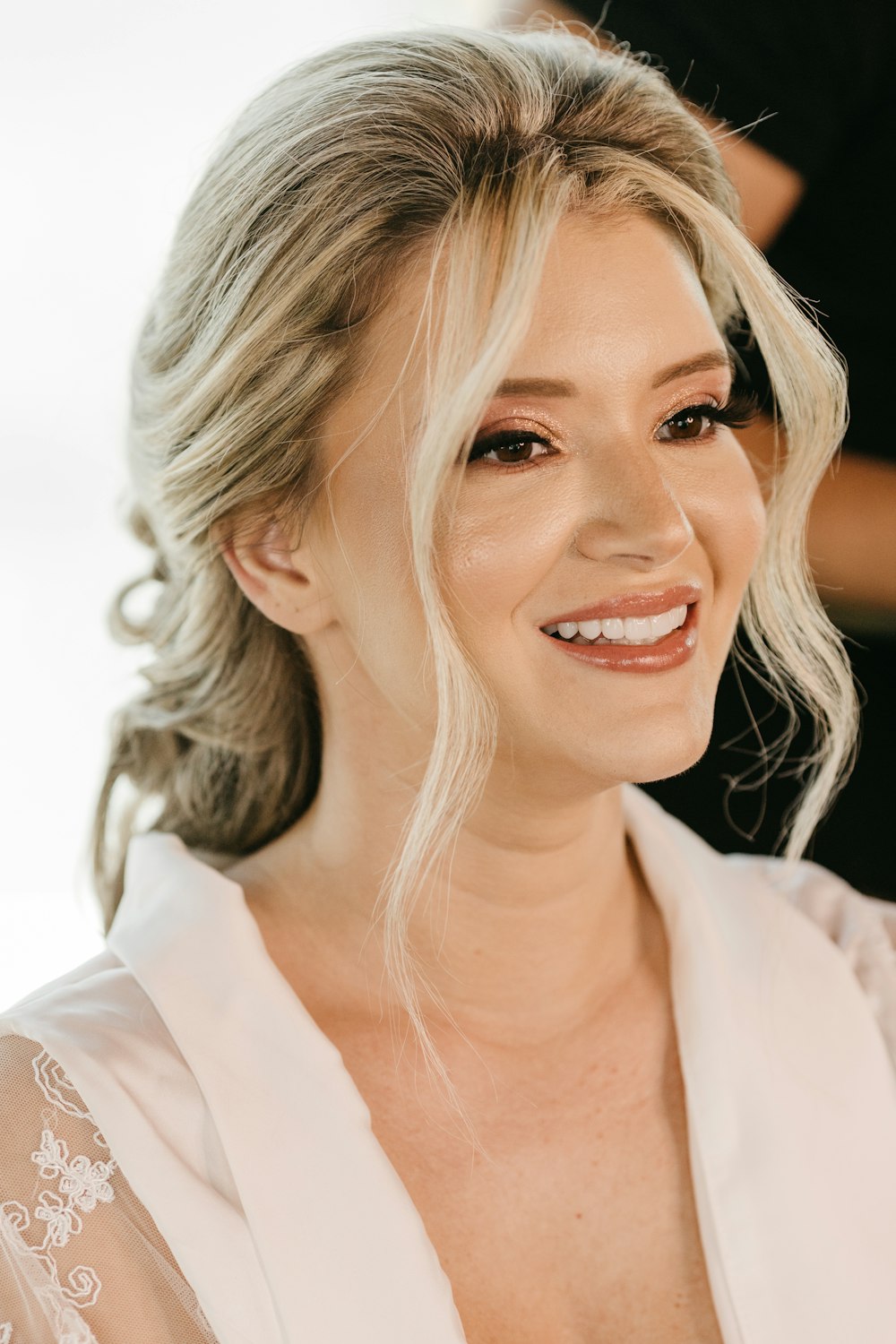 a close up of a woman with blonde hair