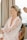 A satisfied customer enjoying Ingrid Romana's services.