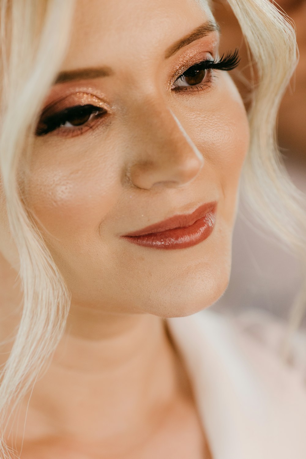 a close up of a woman with blonde hair