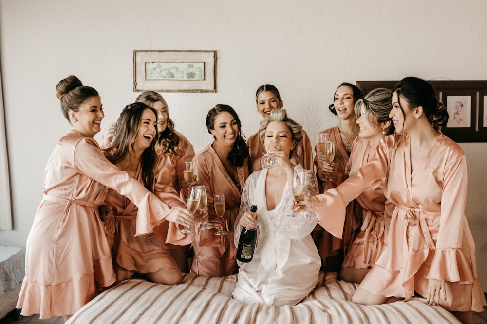 a group of women standing around each other