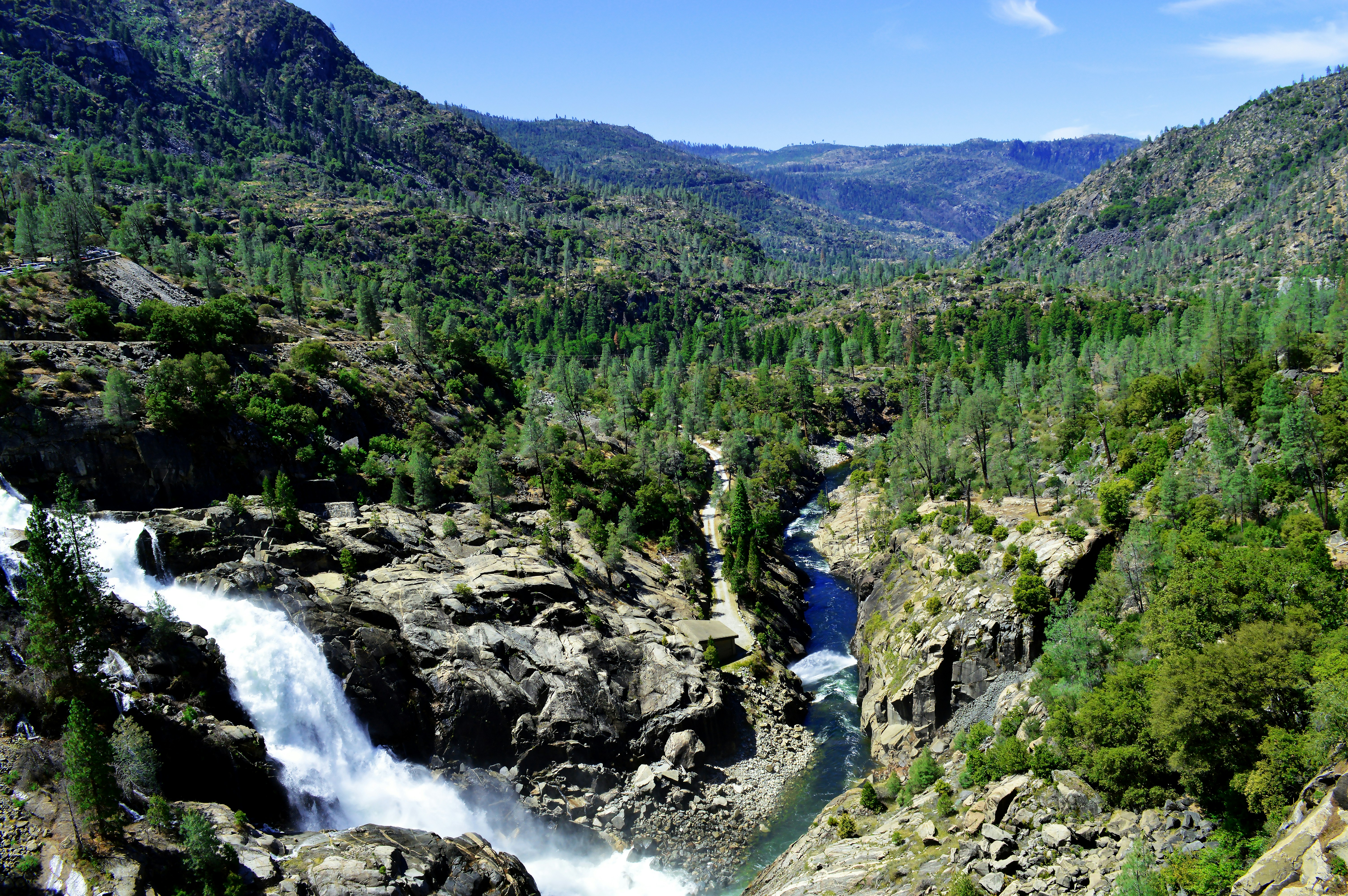 a river running through a lush green forest, Hetch Hetchy - Yosemite - National Park Service</p><p>Hidden in Yosemite National Park’s peaceful northwest corner, Hetch Hetchy Valley is a treasure worth visiting in all seasons. Located at 3,900 feet, Hetch Hetchy boasts one of the longest hiking seasons in the park and is an ideal place for thundering spring waterfalls and wildflower displays. High temperatures prevail in summer months, but that is a small price to pay for the reward of vast wilderness filled with stunning peaks, hidden canyons, and remote lakes.