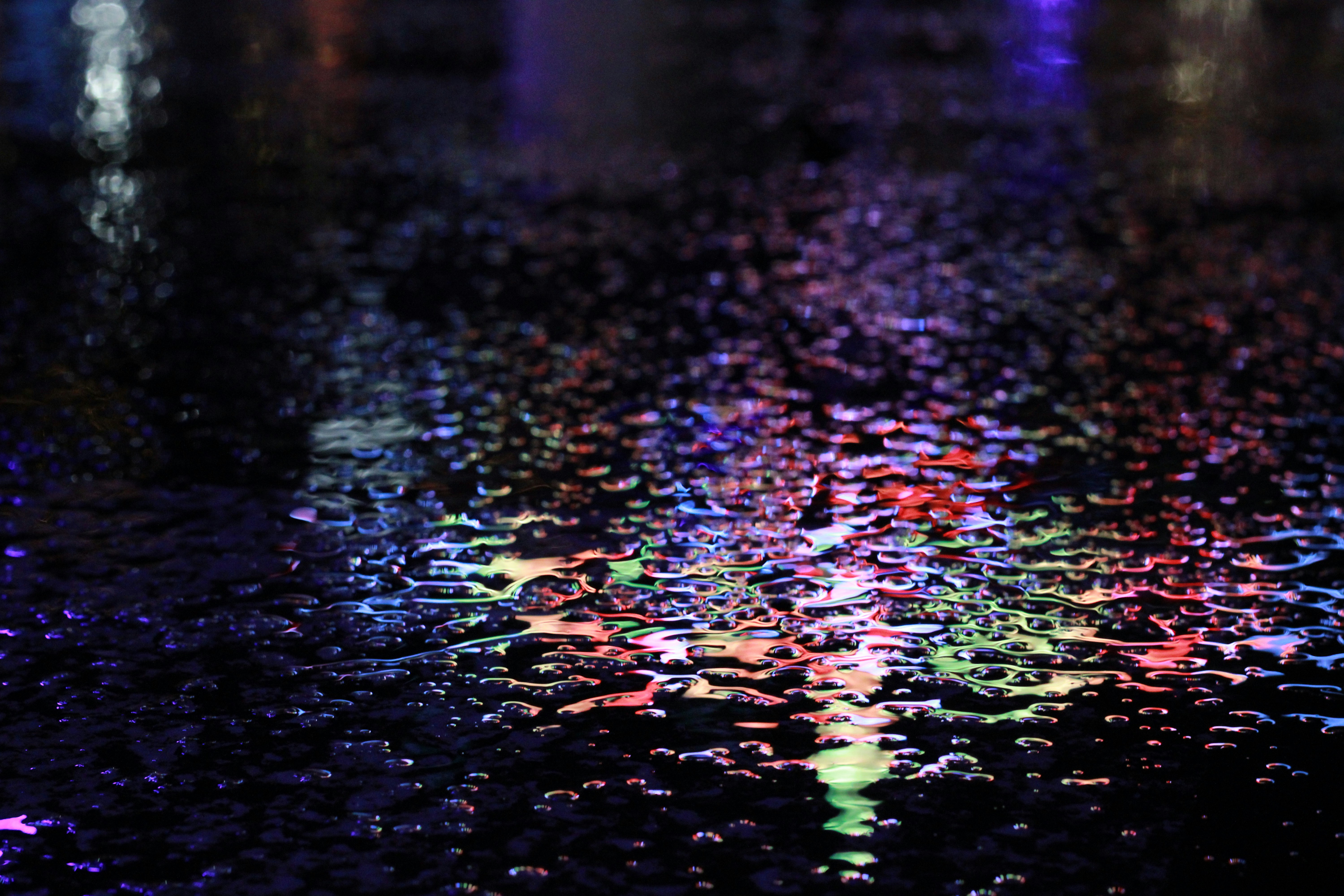 a street that has a lot of rain on it