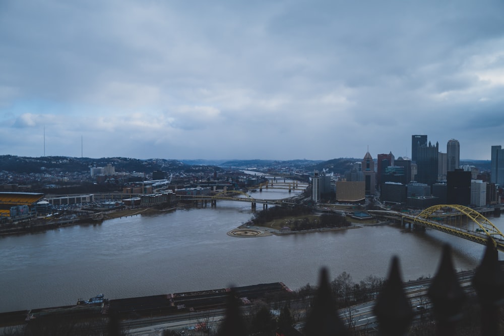 a view of a river and a bridge in a city