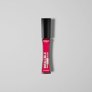 A tube of L'Oreal Paris Infallible Pro Matte Gloss, featuring a black cap and vibrant pink labeling. The product is centered against a light gray background.