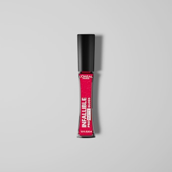 A tube of L'Oreal Paris Infallible Pro Matte Gloss, featuring a black cap and vibrant pink labeling. The product is centered against a light gray background.