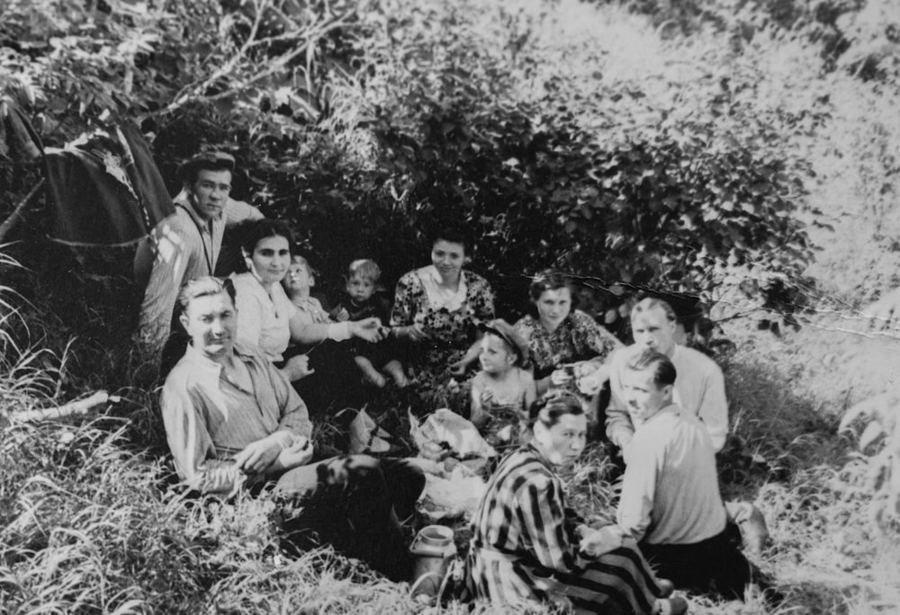 a black and white photo of a group of people