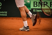 a tennis player with a tennis racket in his hand