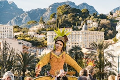 a woman dressed in a costume standing in front of a crowd of people