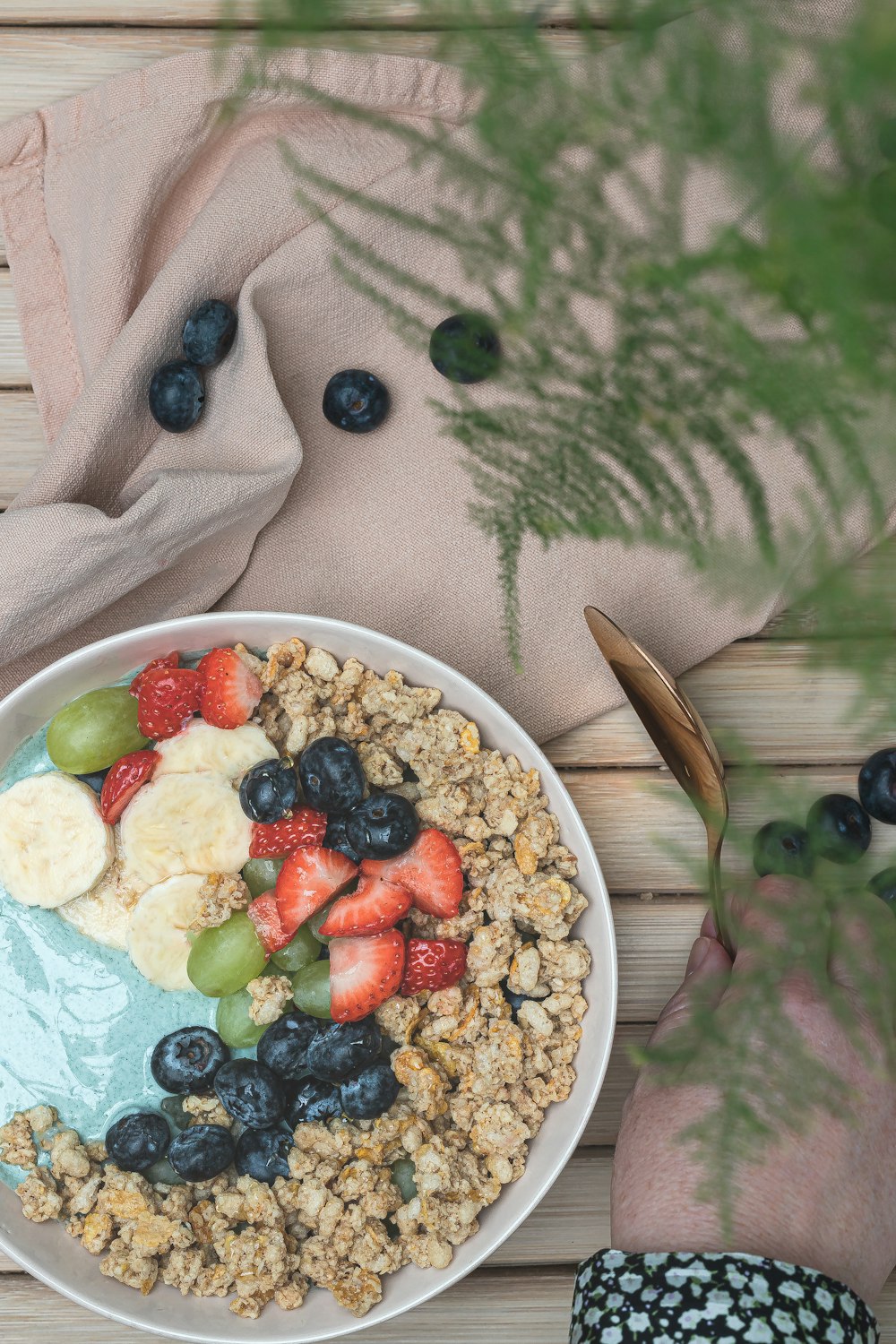 a bowl of cereal with fruit and yogurt