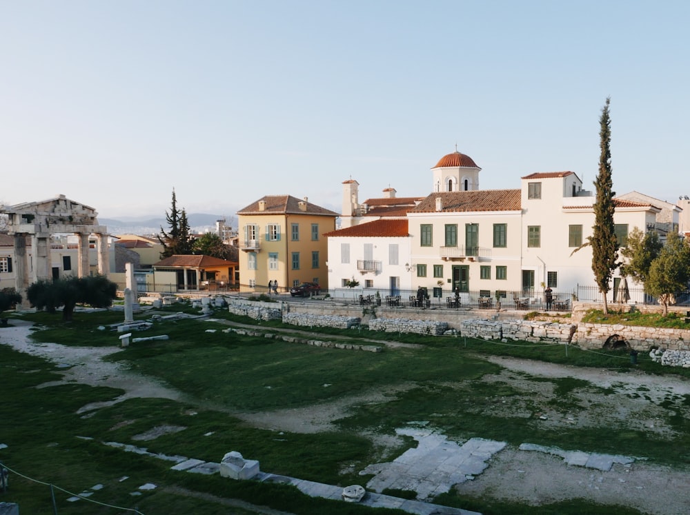 a large white building with a red roof