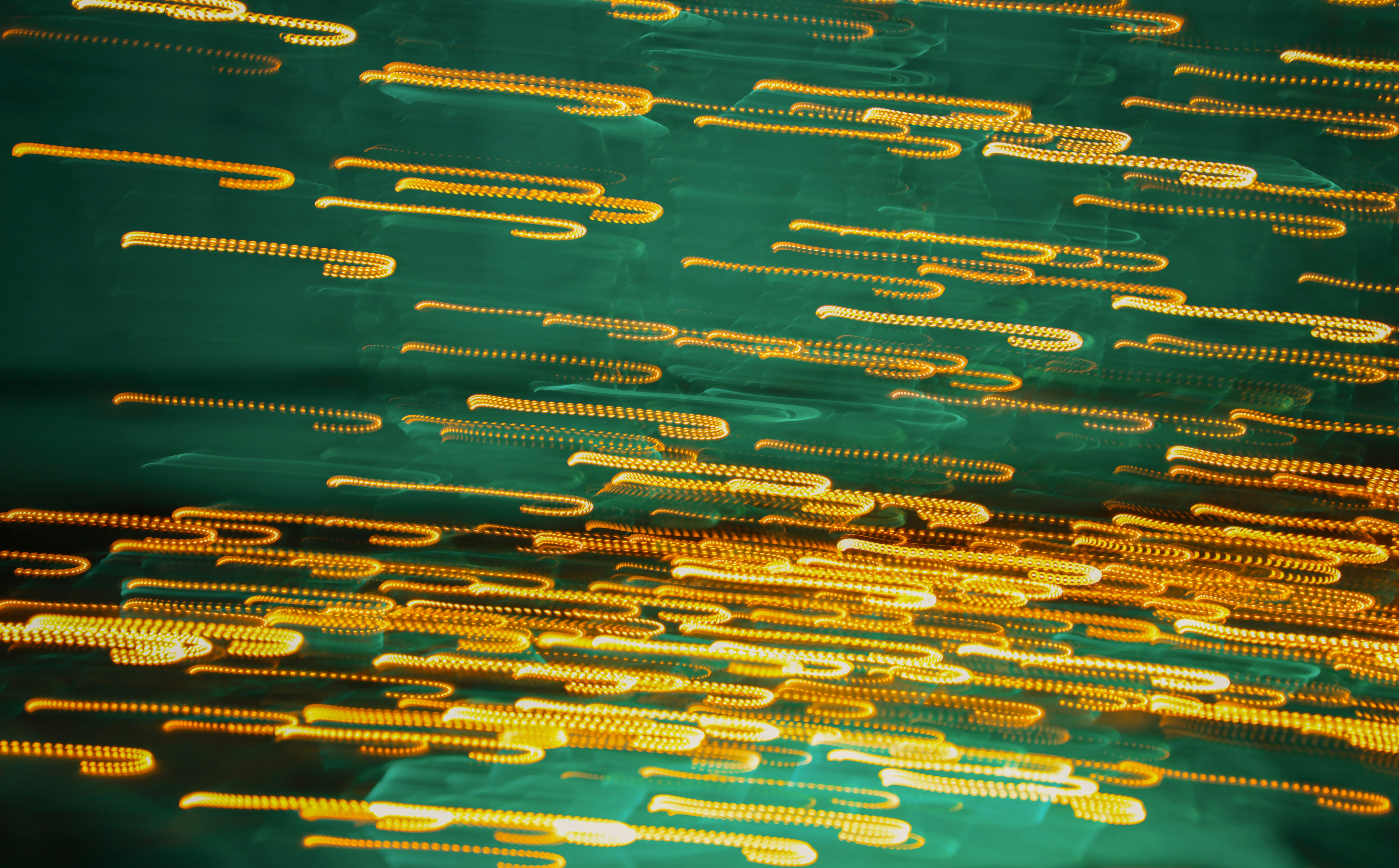 a close up of a green and yellow background