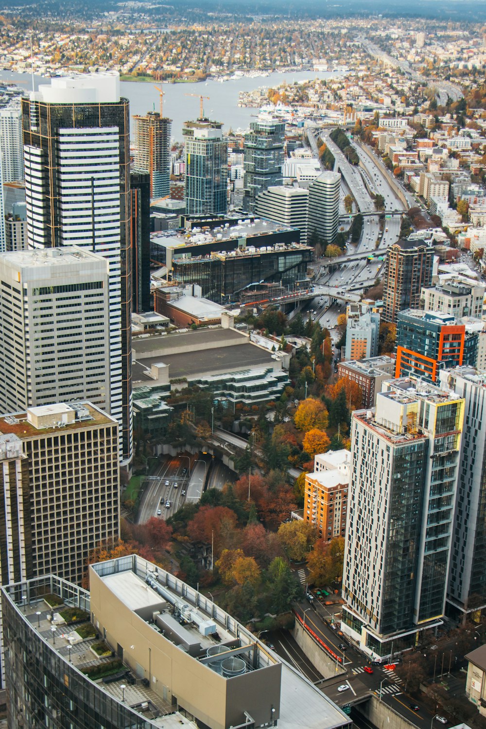 an aerial view of a city with tall buildings