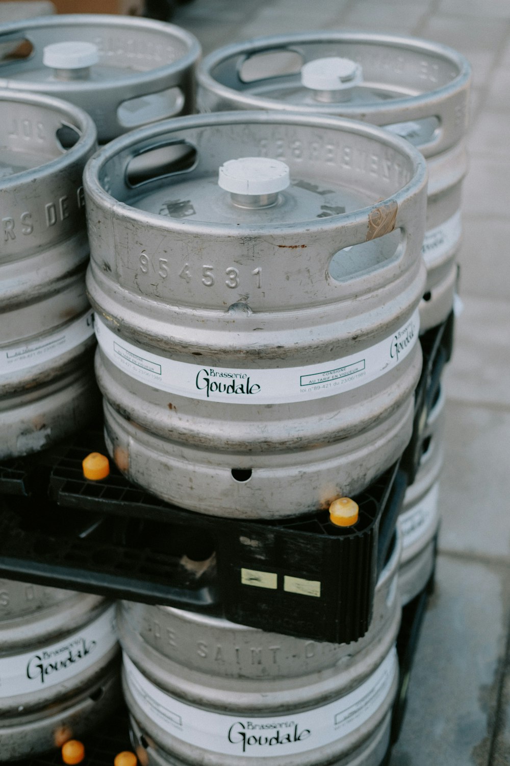 a stack of kegs sitting on top of each other