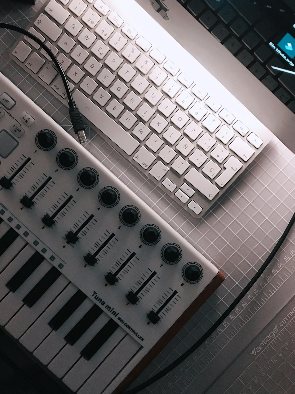 a keyboard and a mouse on a table