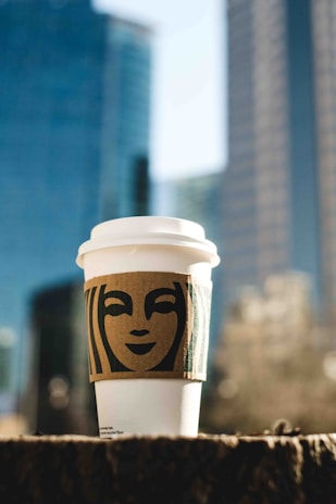 Takeaway coffee cups lined up ready for busy commuters on the go.