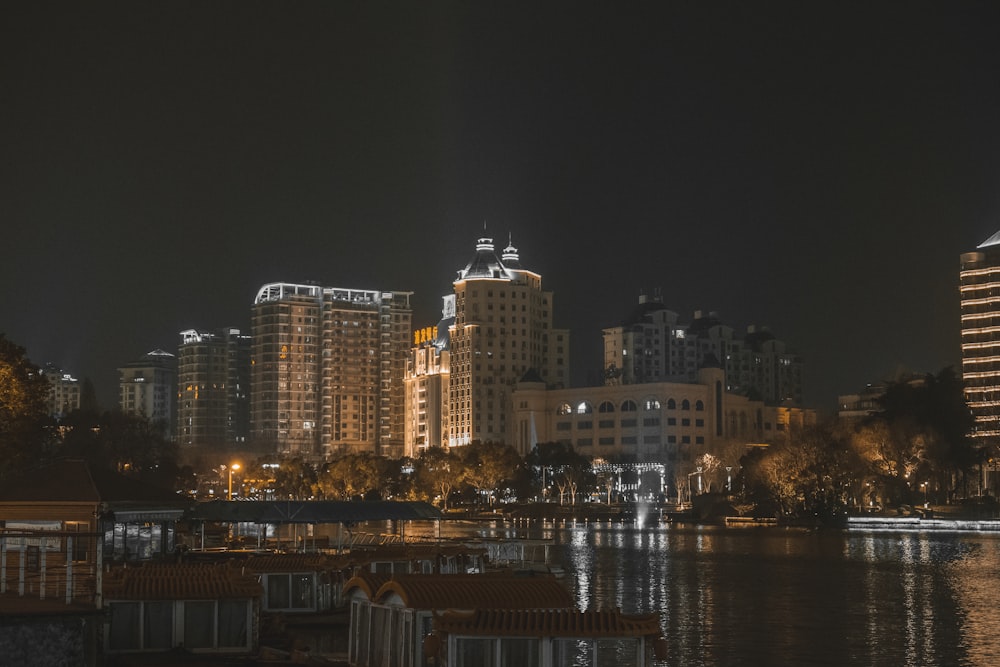 a view of a city at night from across the water