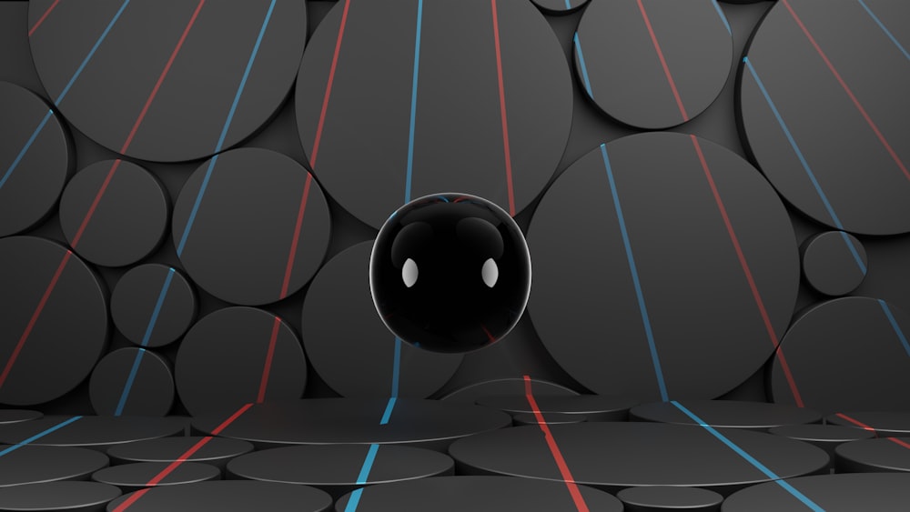 a black object with blue and red lines on it