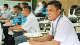 a group of people sitting at tables in a room