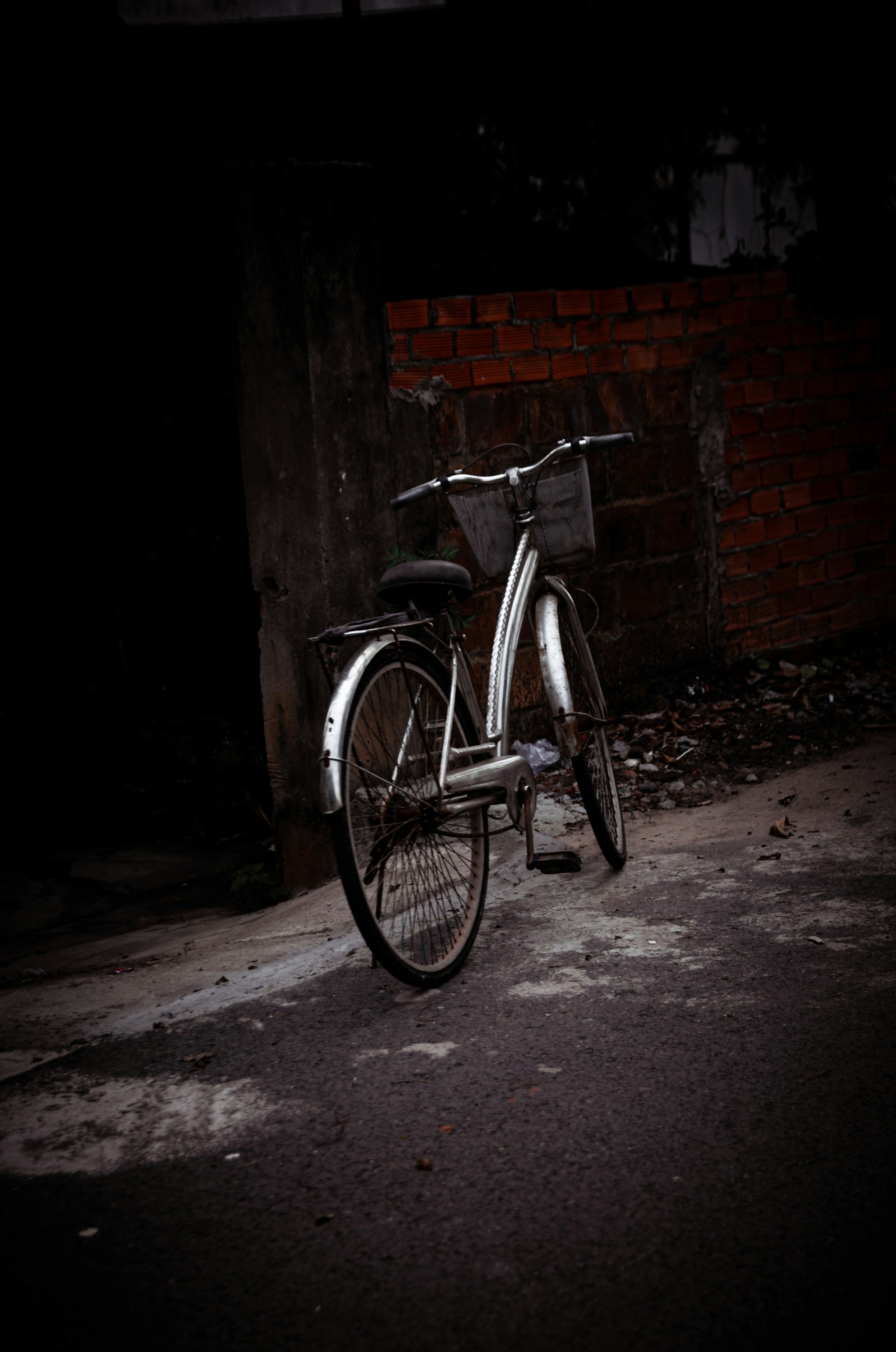 a bike parked on the side of a road