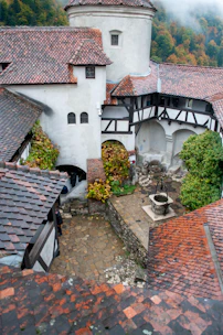 an aerial view of a building with a clock tower