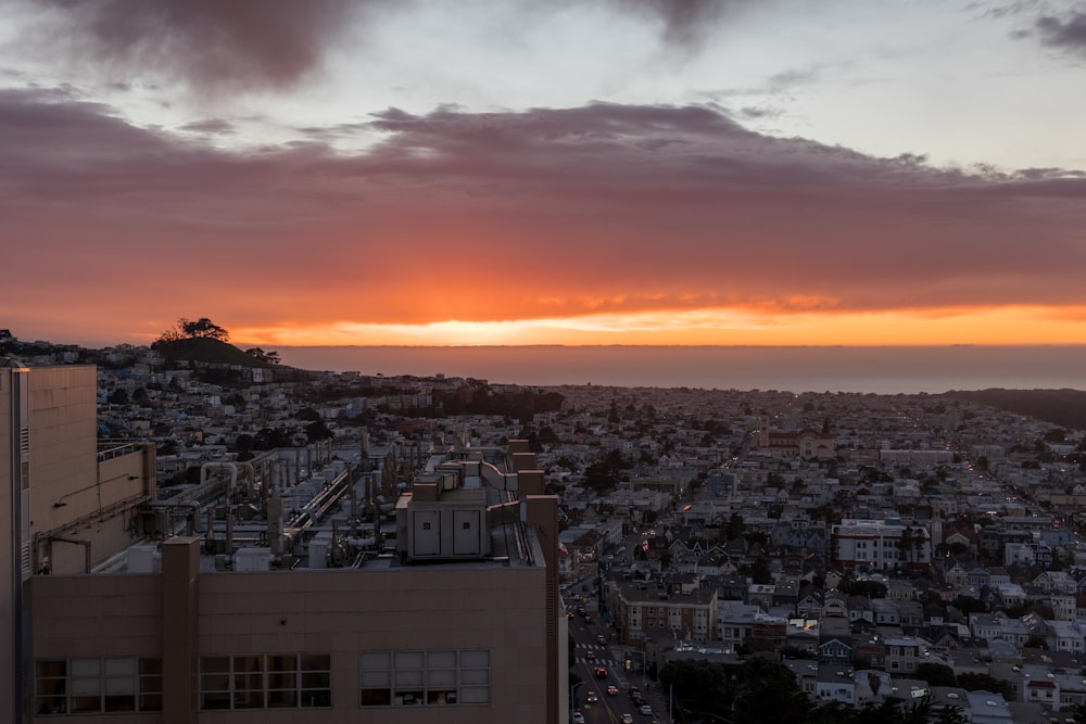 a sunset over a city