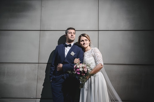 a man and a woman standing next to each other