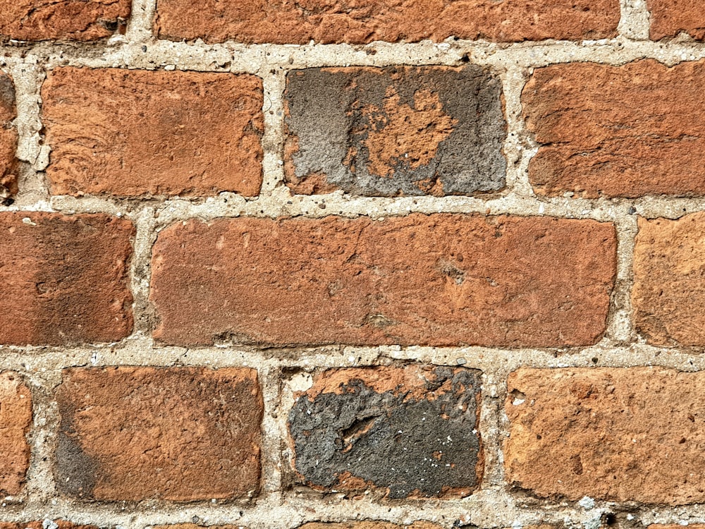 a close up of a brick wall made of bricks