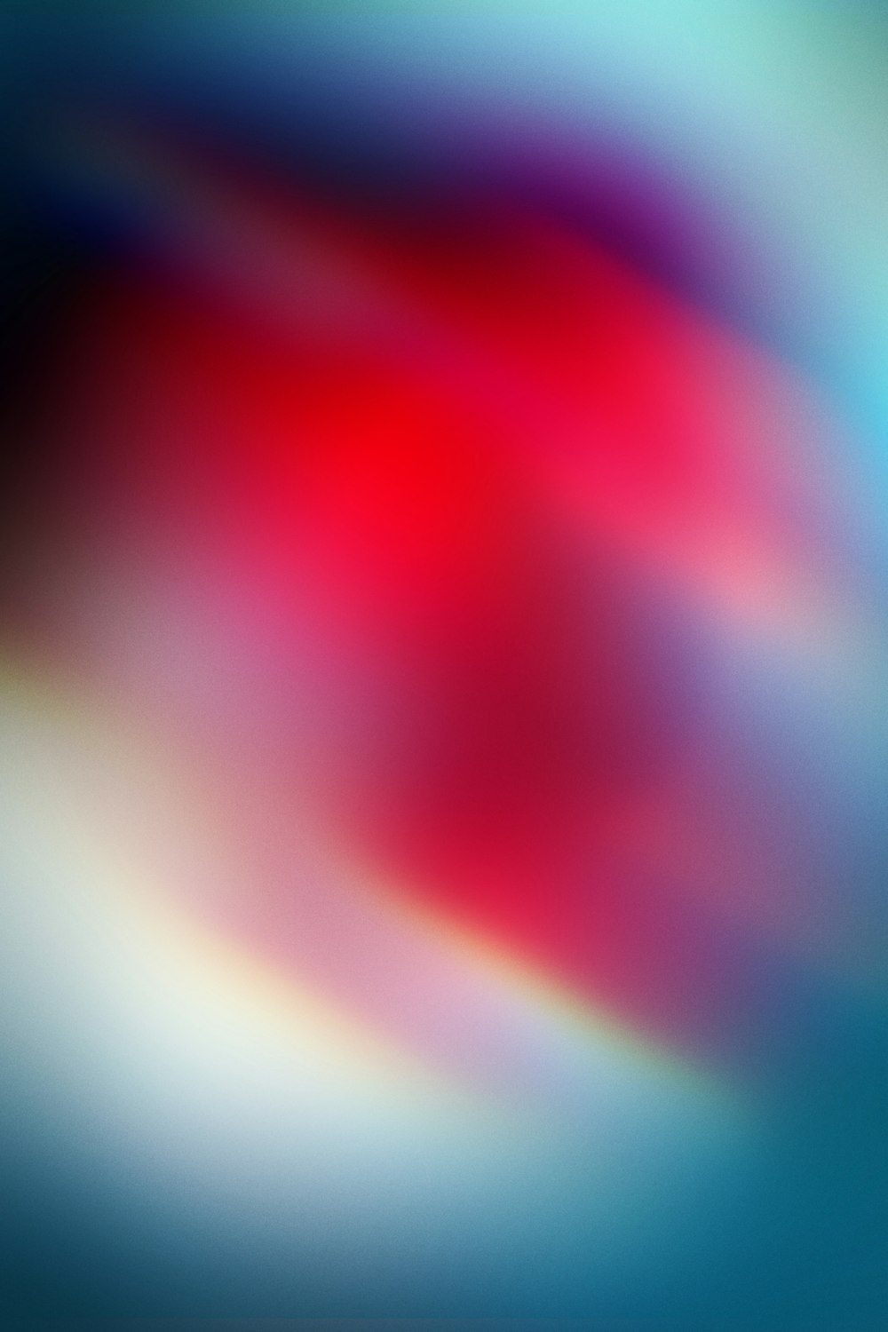 a blurry image of a red and blue background