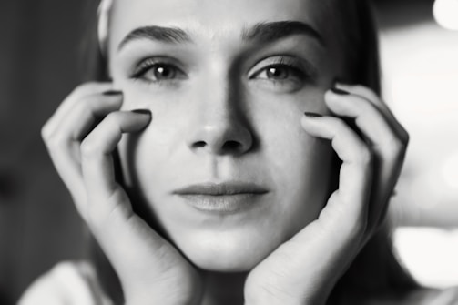 A close-up portrait capturing thoughtful expression.