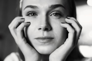 Close-up image showing thoughtful expression, framed with smooth rounded corners.