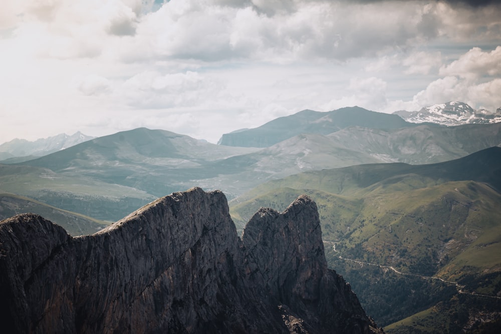 a mountain range with mountains in the background