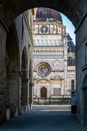 a large building with a clock on it's side