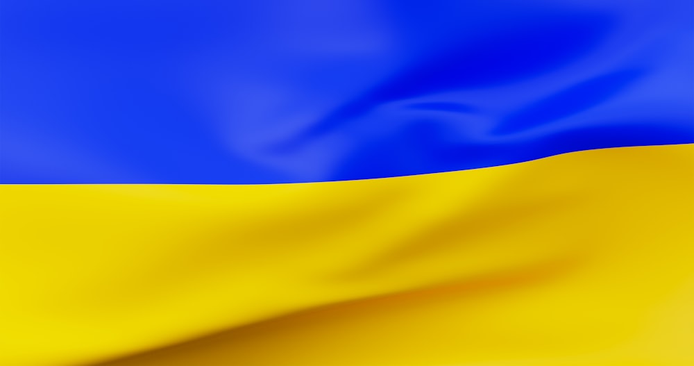 una bandiera blu e gialla con una striscia bianca