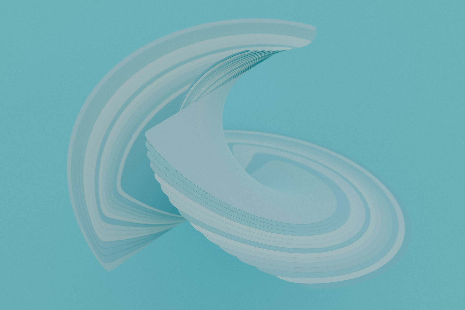 a stack of white paper sitting on top of a blue surface