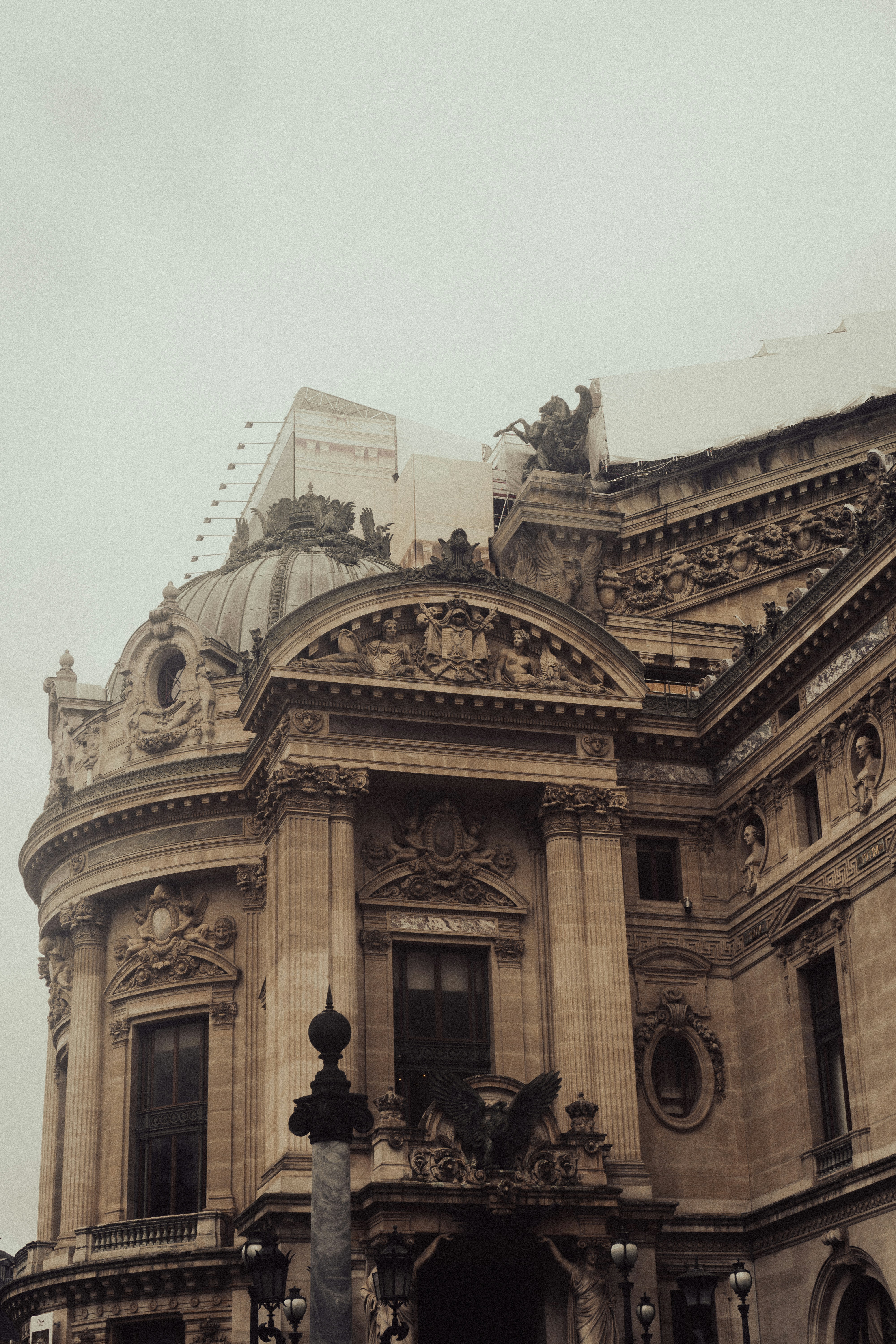 a large building with a clock on the front of it