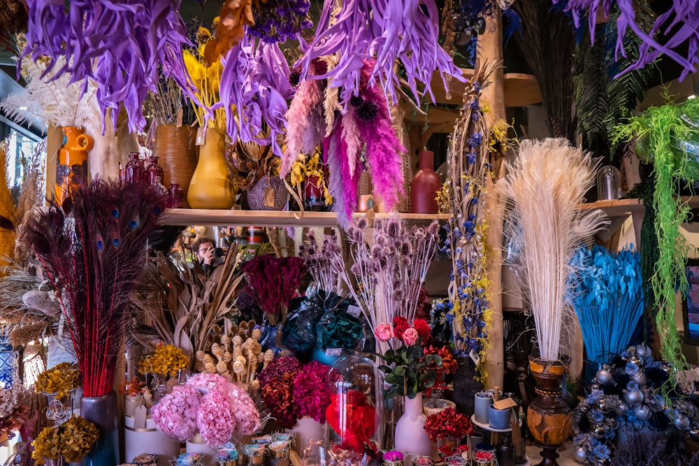 a room filled with lots of different types of flowers