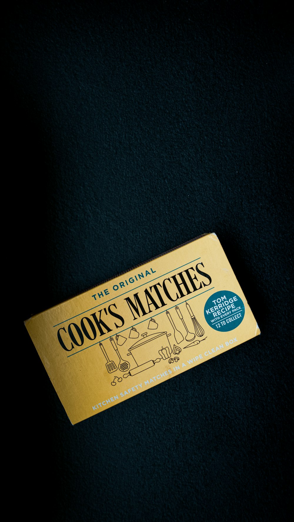 a box of cook's matches sitting on top of a table