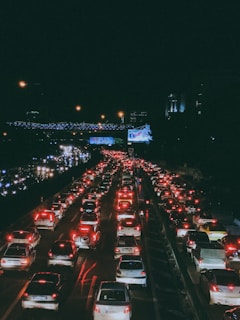 a highway filled with lots of traffic at night