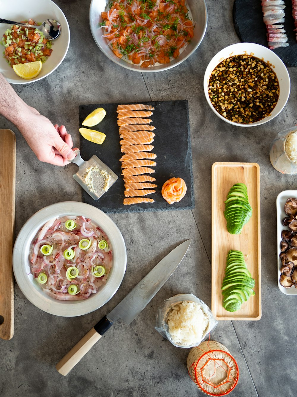 a table topped with plates of food and a knife