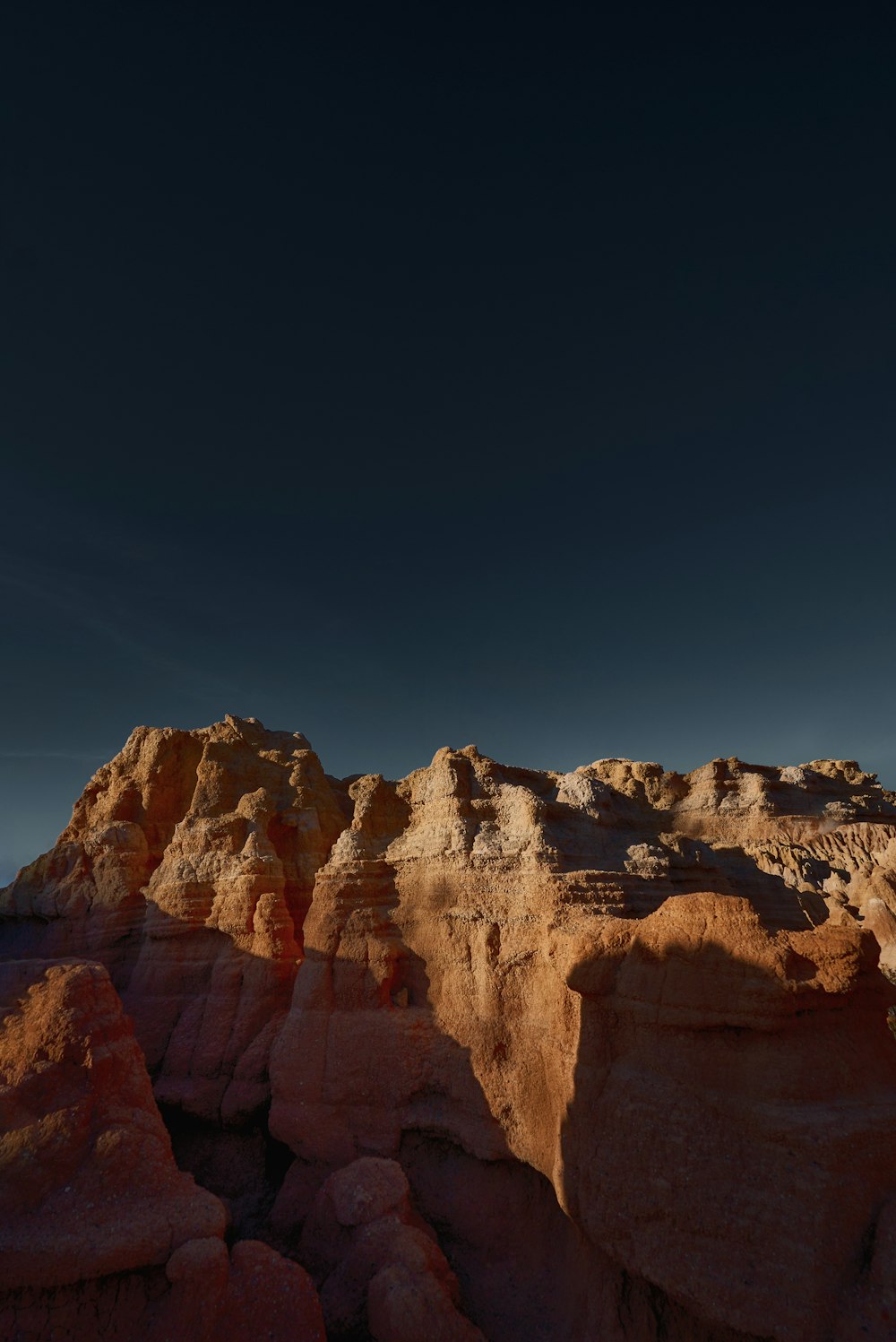 a canyon with a mountain in the background